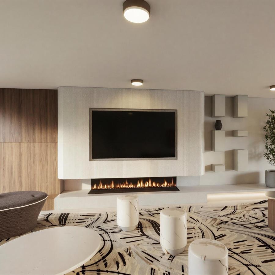 lounge with a TV and modern decor